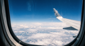 Reading FSH and Estradiol on a Lab Report: Units, Reference Ranges and Why Your Numbers Don't Match 2 Clouds seen through an airplane window with the wing tip at the frame edge